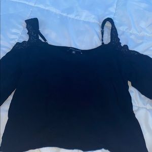 black shirt with loose sleeves and floral top